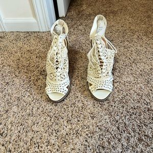 White lace up booties. Size 7.5